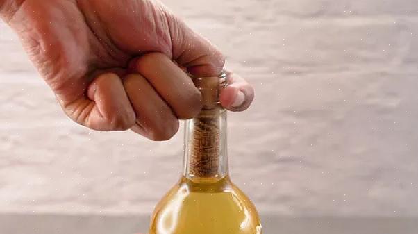 אם המכסים מאובטחים כראוי, חגורת מכסה הבקבוק גמורה
