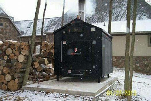 תנור עצים בדוד מרכזי הוא מה שאתה צריך כדי לחמם את הבית שלך